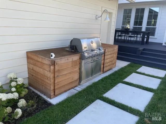 a view of backyard with seating space