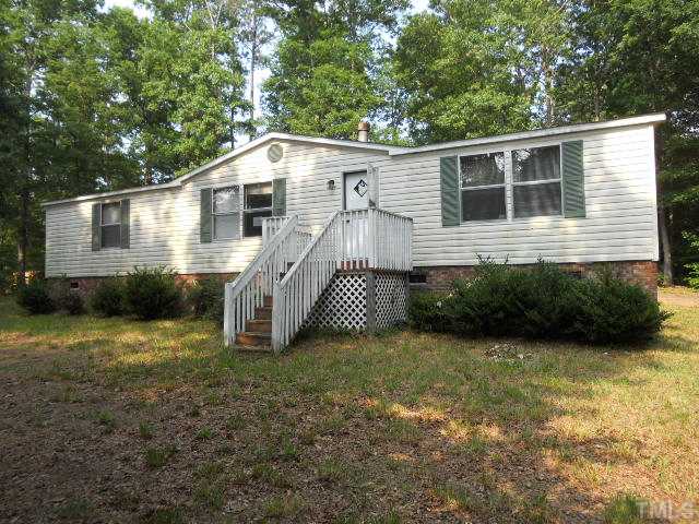1332 Yakimas Road Raleigh, NC 27603 - Photo 1 of 9 a house view with a garden space