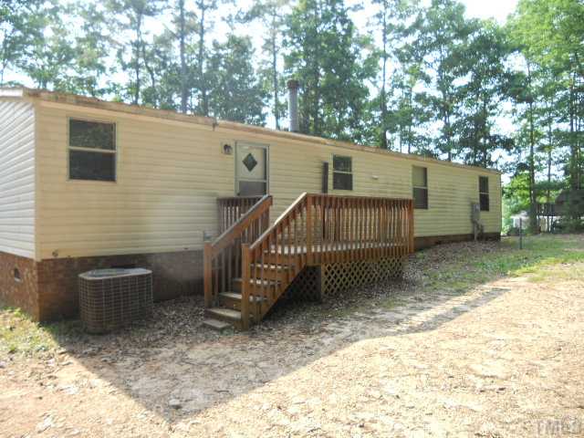 1332 Yakimas Road Raleigh, NC 27603 - Photo 2 of 9 a view of a house with a yard