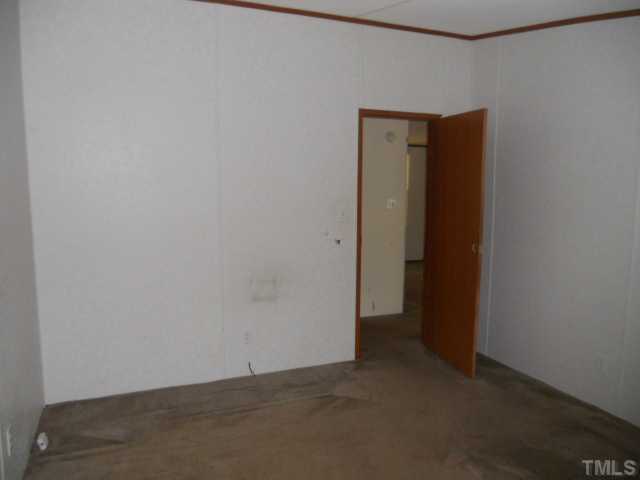 1332 Yakimas Road Raleigh, NC 27603 - Photo 9 of 9 a view of an empty room