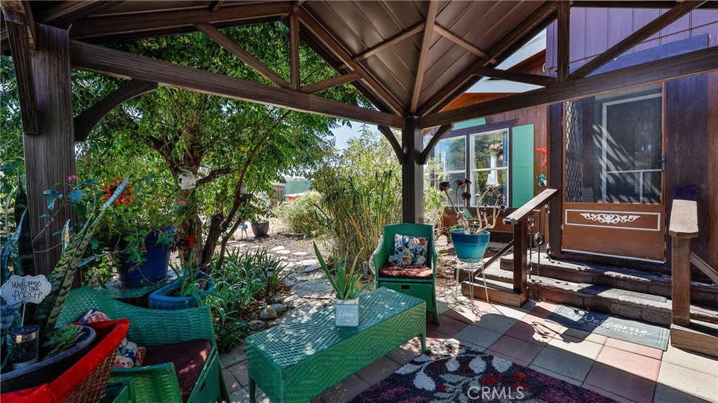 39550 Kirby Road Anza, CA 92539 - Photo 2 of 53 a view of a patio with chair and tables back yard of the house