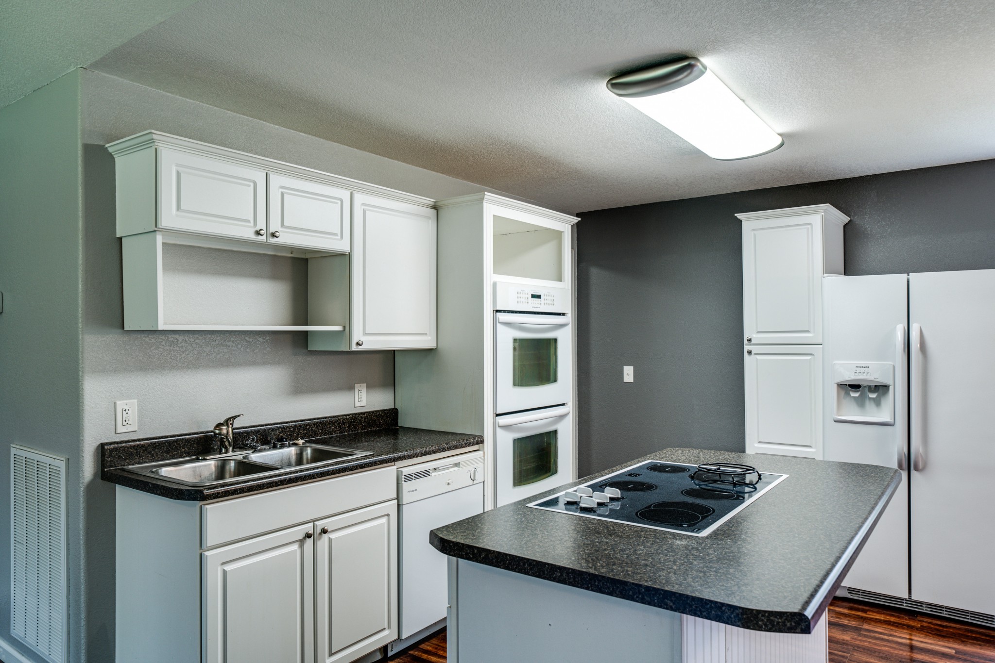 0 Lloyd Hall Loop Deer Lodge, TN 37726 - Photo 13 of 46 a kitchen with stainless steel appliances granite countertop a sink stove and refrigerator