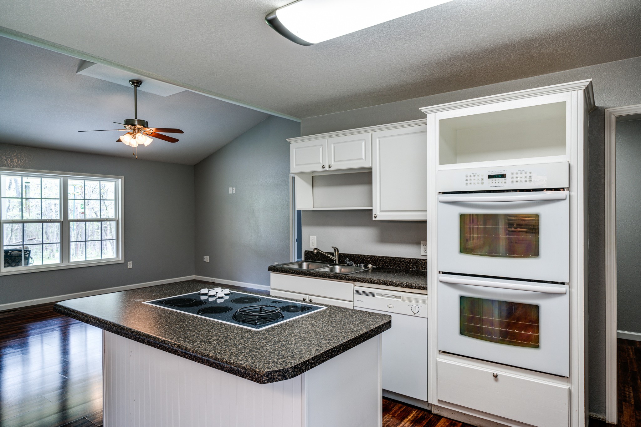 0 Lloyd Hall Loop Deer Lodge, TN 37726 - Photo 15 of 46 a kitchen with stainless steel appliances granite countertop a stove and a microwave