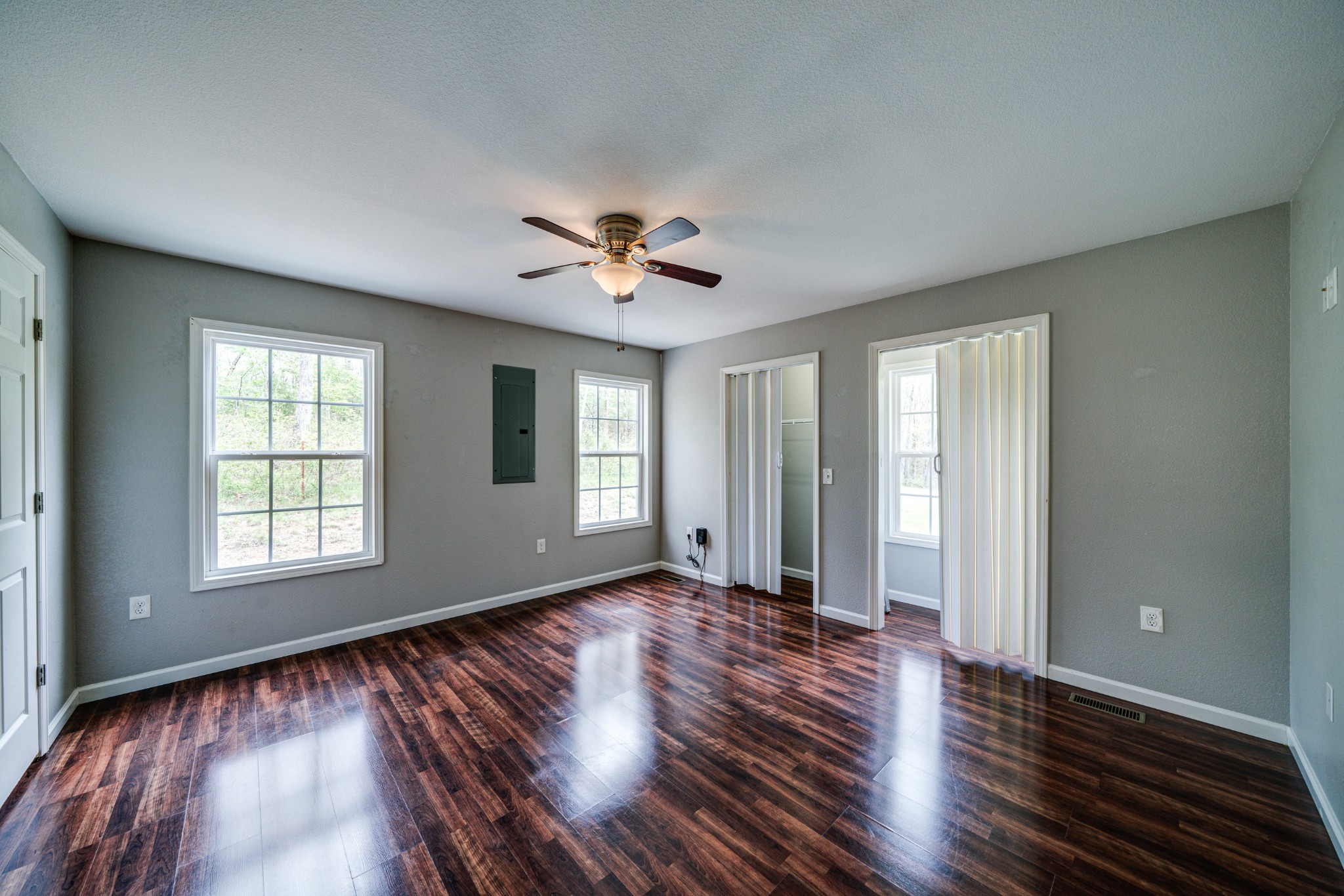 0 Lloyd Hall Loop Deer Lodge, TN 37726 - Photo 19 of 46 an empty room with wooden floor and windows