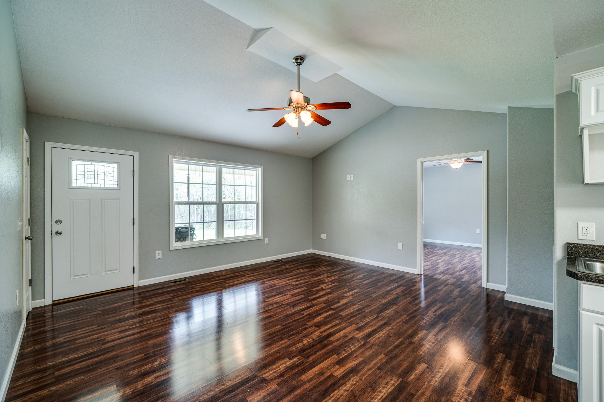 0 Lloyd Hall Loop Deer Lodge, TN 37726 - Photo 3 of 46 a view of empty room with wooden floor and fan