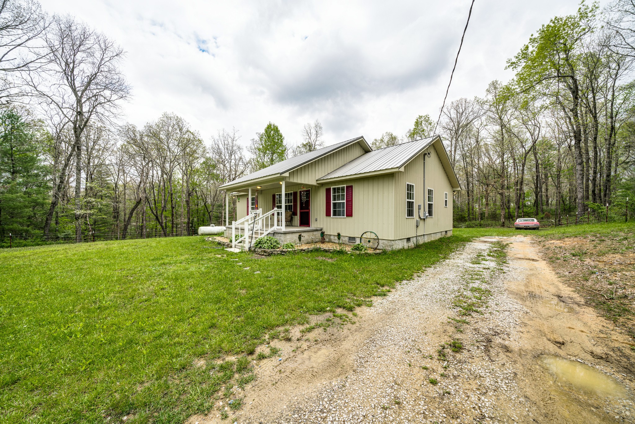 0 Lloyd Hall Loop Deer Lodge, TN 37726 - Photo 32 of 46 a front view of a house with garden