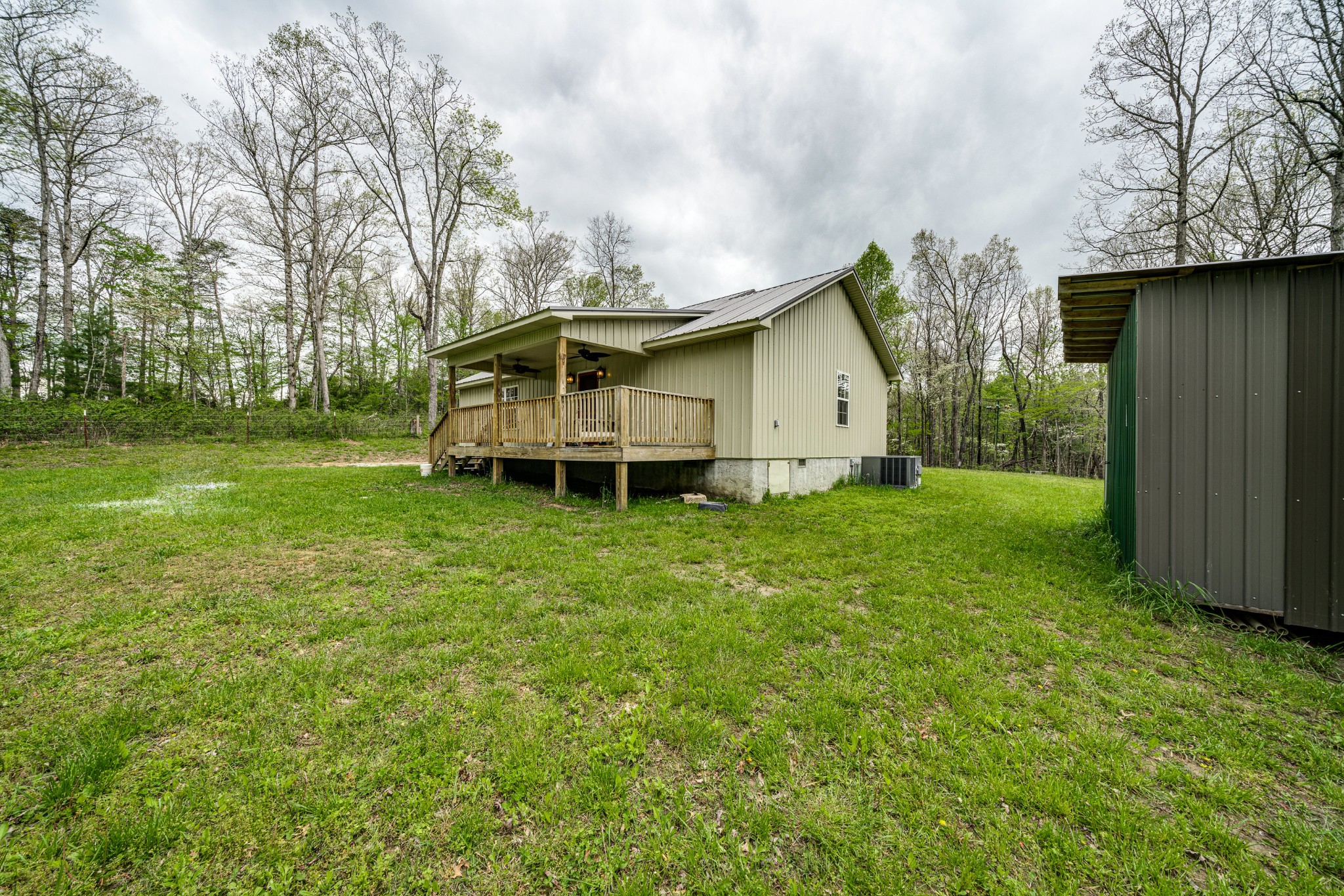 0 Lloyd Hall Loop Deer Lodge, TN 37726 - Photo 39 of 46 a front view of a house with garden