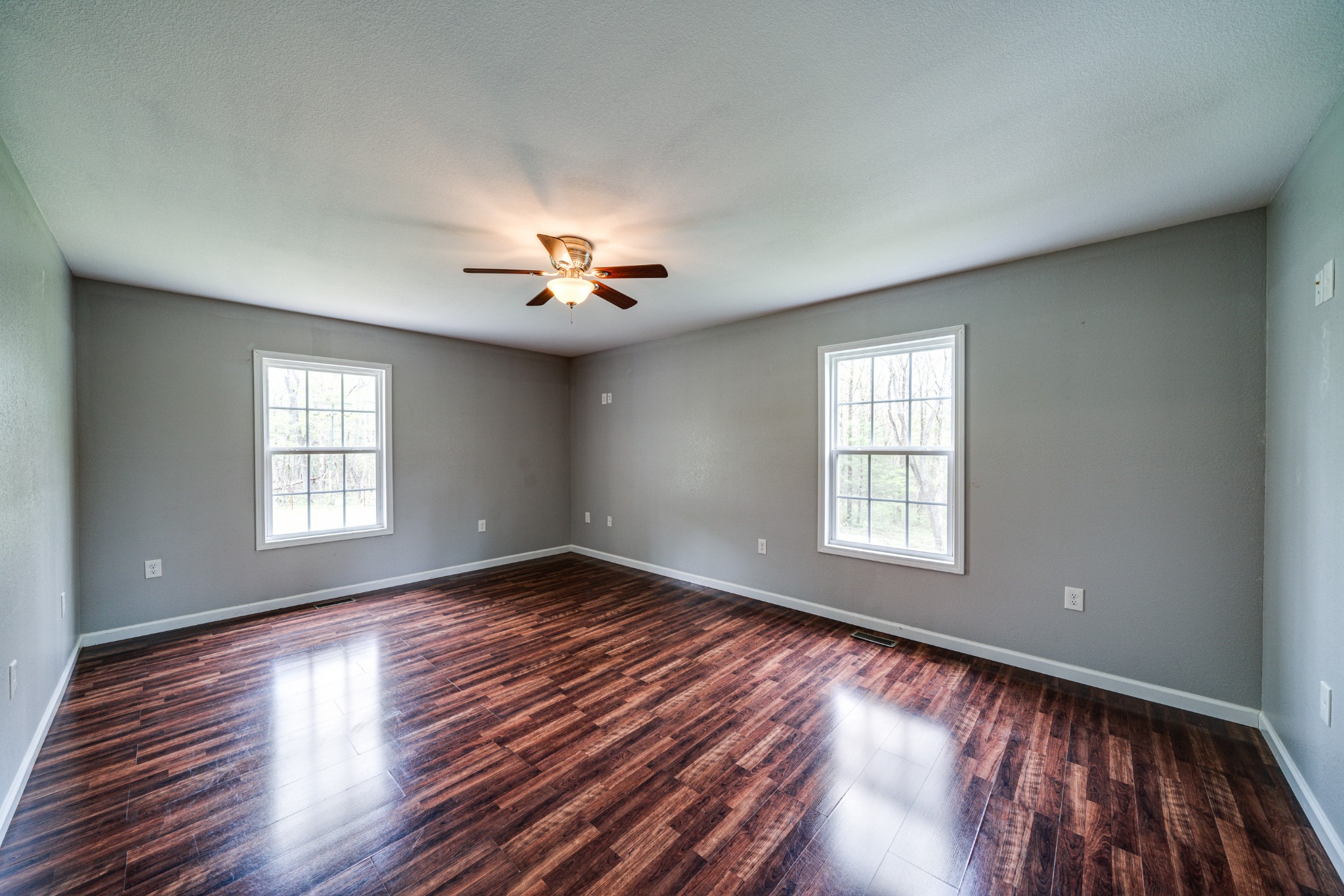 0 Lloyd Hall Loop Deer Lodge, TN 37726 - Photo 6 of 46 a view of an empty room with wooden floor and a window