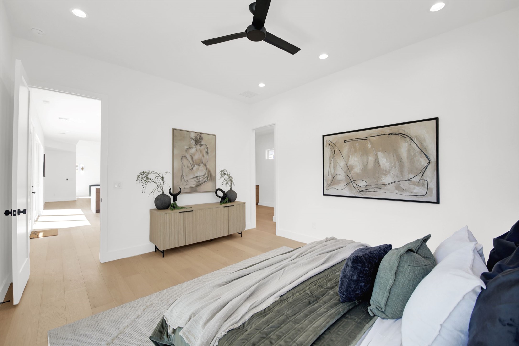 1310 Cullen Avenue Austin, TX 78757 - Photo 15 of 40 Primary bedroom featuring light wood finished floors, ceiling fan, and recessed lighting