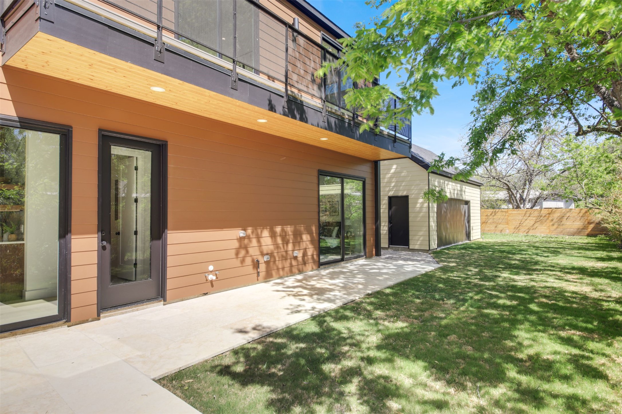 1310 Cullen Avenue Austin, TX 78757 - Photo 38 of 40 Back of property with a patio area and a balcony and hook-ups for outdoor kitchen