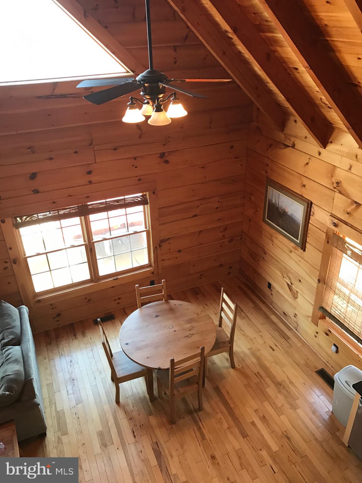 205 Meadow Hill Lane Rileyville, VA 22650 - Photo 15 of 53 a view of a livingroom with furniture window and wooden floor