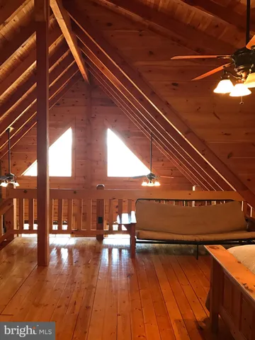 a view of outdoor space with wooden floor