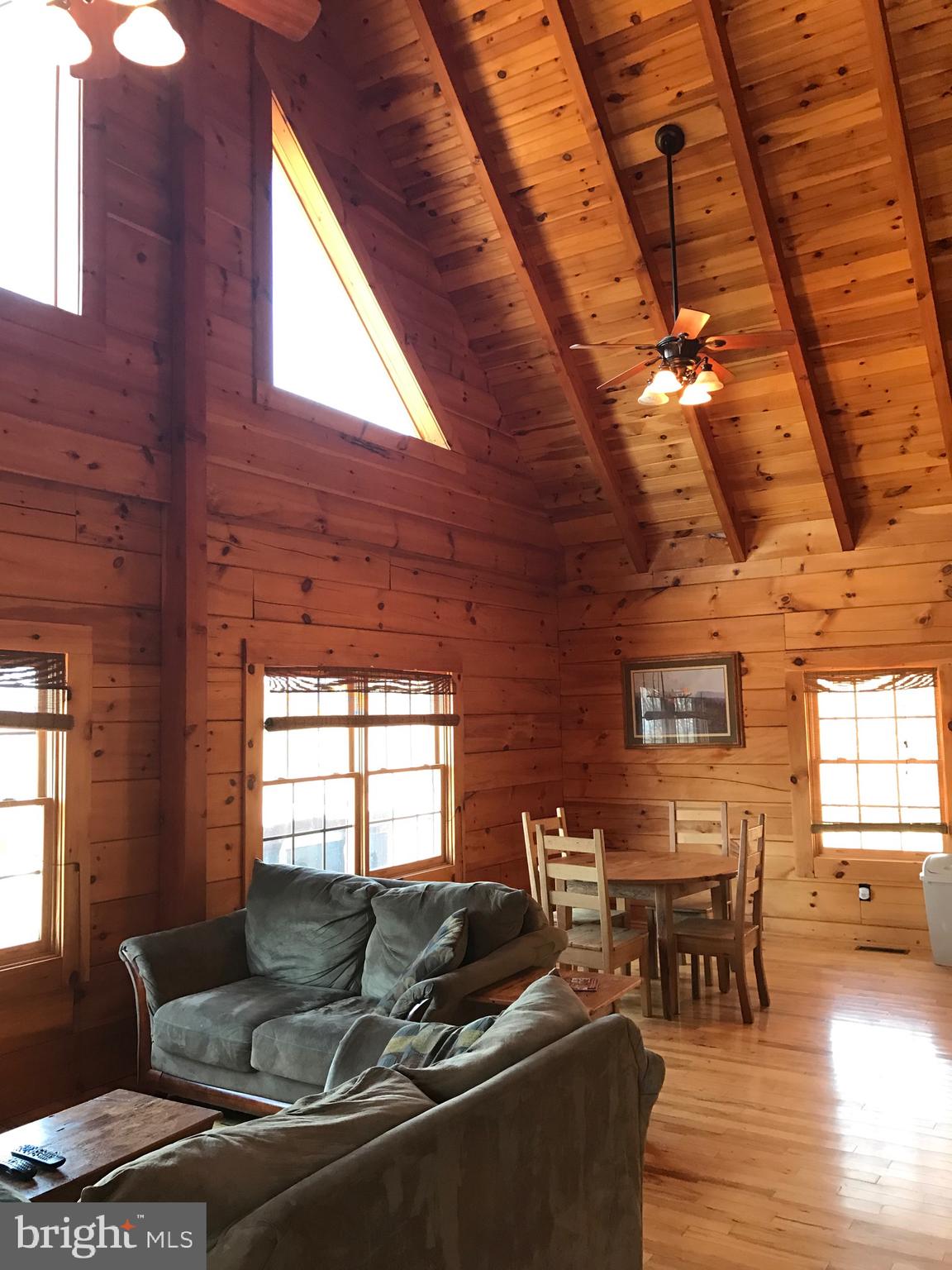 205 Meadow Hill Lane Rileyville, VA 22650 - Photo 22 of 53 a living room with furniture and wooden floor