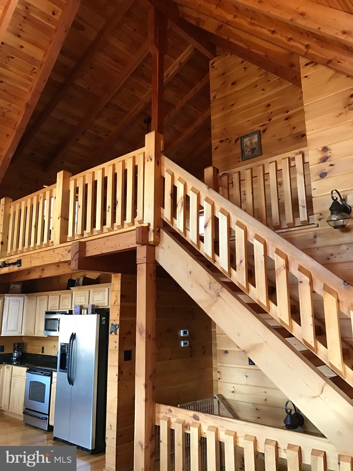205 Meadow Hill Lane Rileyville, VA 22650 - Photo 31 of 53 a front view of a building with glass door