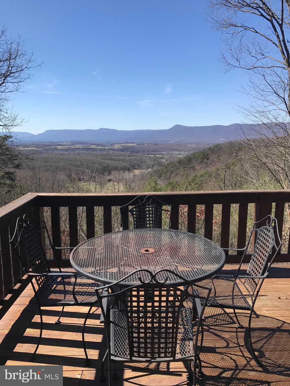 205 Meadow Hill Lane Rileyville, VA 22650 - Photo 52 of 53 a view of a chairs and table on the terrace