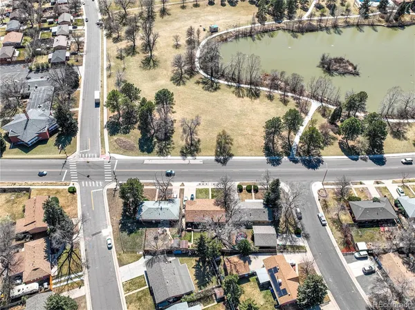 an aerial view of houses with outdoor space