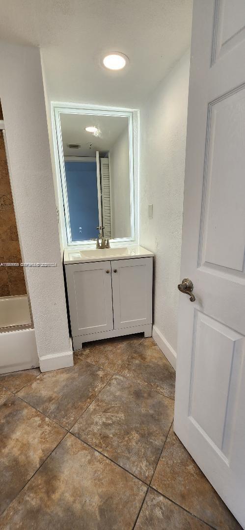1621 Collins Avenue, Unit 404 Miami Beach, FL 33139 - Photo 15 of 26 a view of a hallway with closet