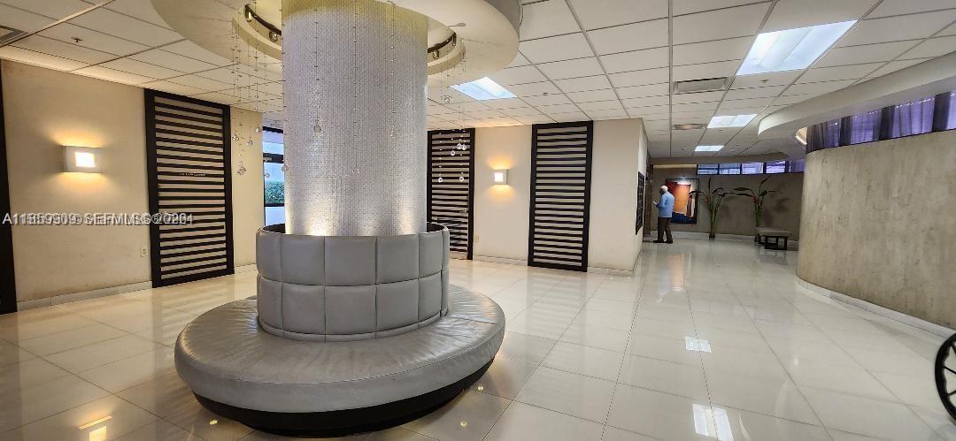 1621 Collins Avenue, Unit 404 Miami Beach, FL 33139 - Photo 25 of 26 a view of a living room and livingroom with furniture