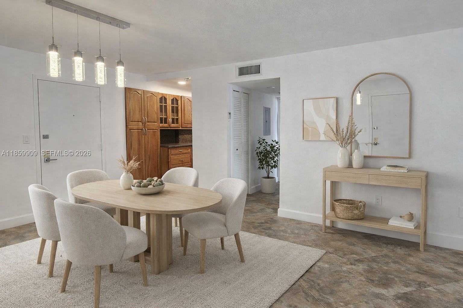 1621 Collins Avenue, Unit 404 Miami Beach, FL 33139 - Photo 8 of 26 a view of a dining room with furniture