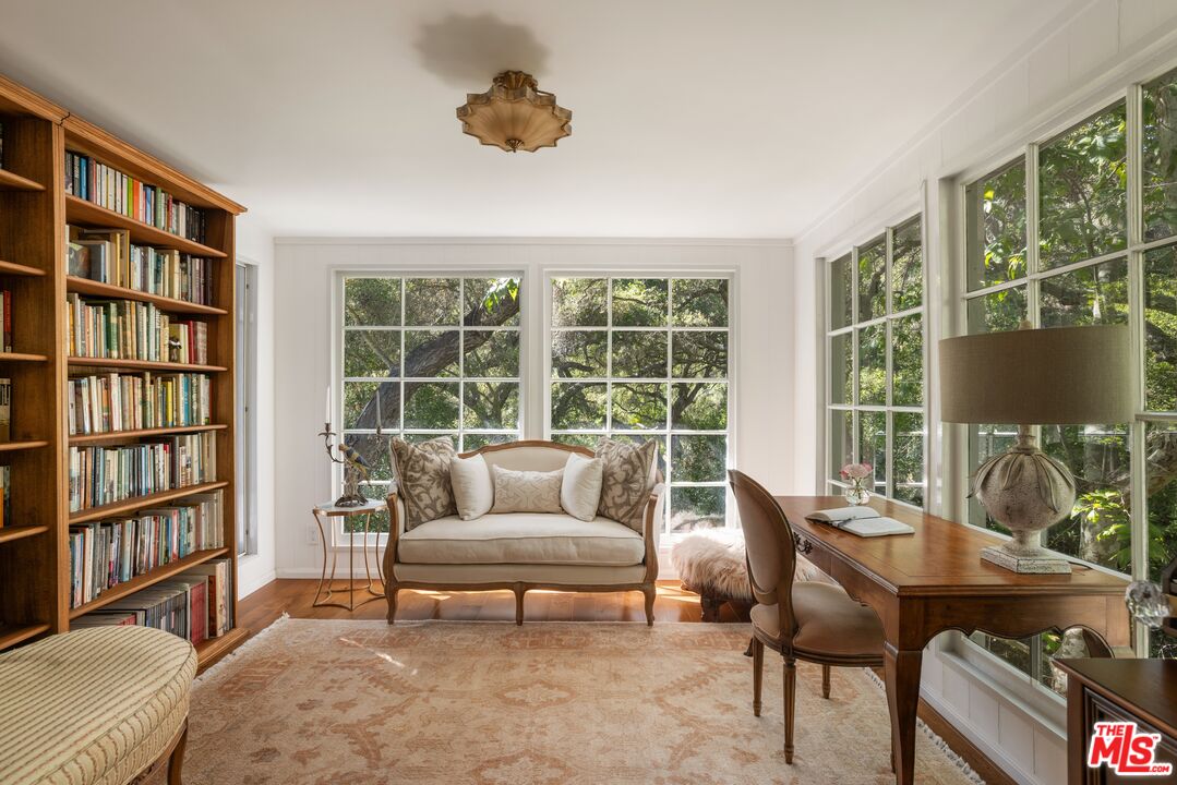 21714 Encina Road Topanga, CA 90290 - Photo 13 of 45 a living room with furniture and a window