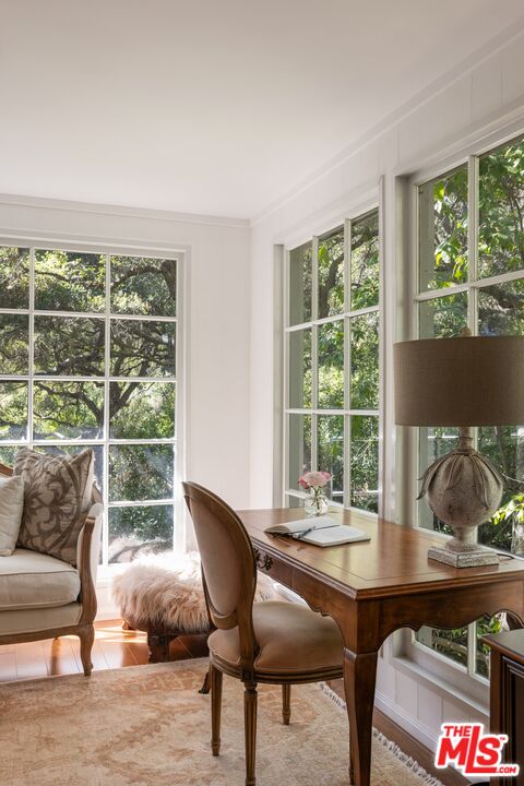 21714 Encina Road Topanga, CA 90290 - Photo 15 of 45 a dining room with furniture and window
