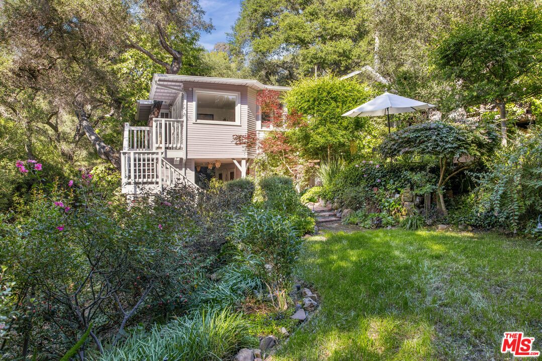 21714 Encina Road Topanga, CA 90290 - Photo 28 of 45 a aerial view of a house with a yard and potted plants