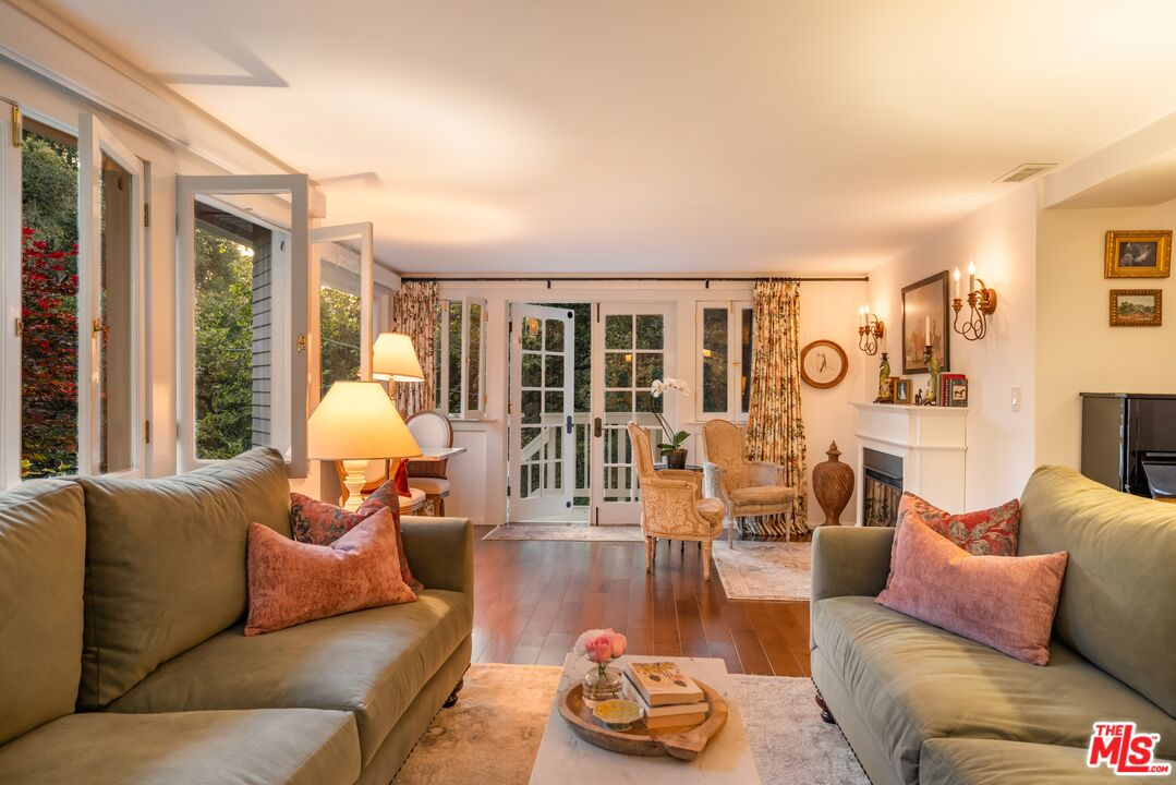 21714 Encina Road Topanga, CA 90290 - Photo 34 of 45 a living room with furniture and a large window