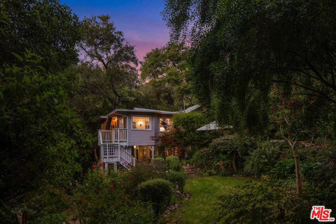 21714 Encina Road Topanga, CA 90290 - Photo 40 of 45 a front view of a house with a yard