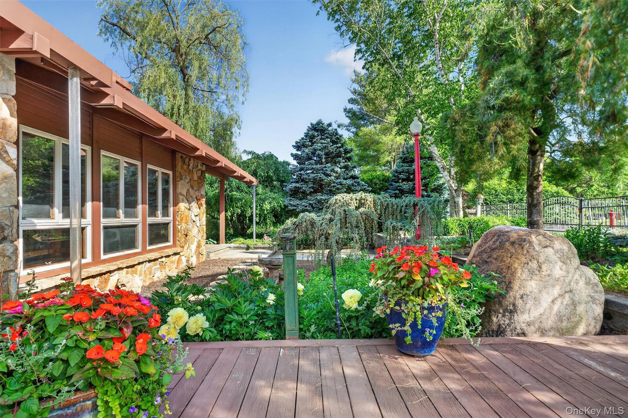 165 Hasbrouck Road Goshen, NY 10924 - Photo 7 of 50 Extensive decks and mature perennial gardens surround the main house