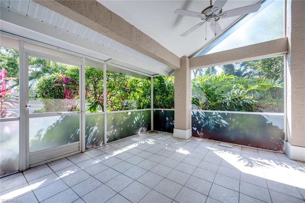 172 Napa Ridge Way Naples, FL 34119 - Photo 11 of 17 a view of a porch and garden