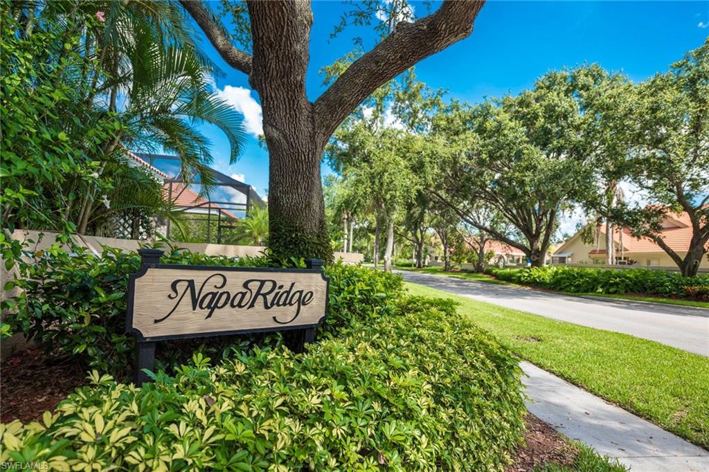 172 Napa Ridge Way Naples, FL 34119 - Photo 17 of 17 a sign on the side of the road