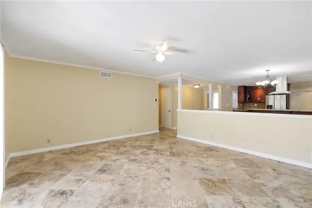 an empty room with a empty space and window