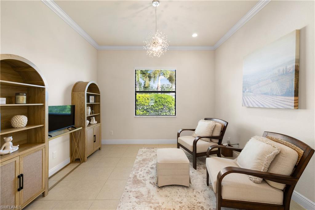 10137 Florence Circle Naples, FL 34119 - Photo 27 of 42 a dining room with furniture and window