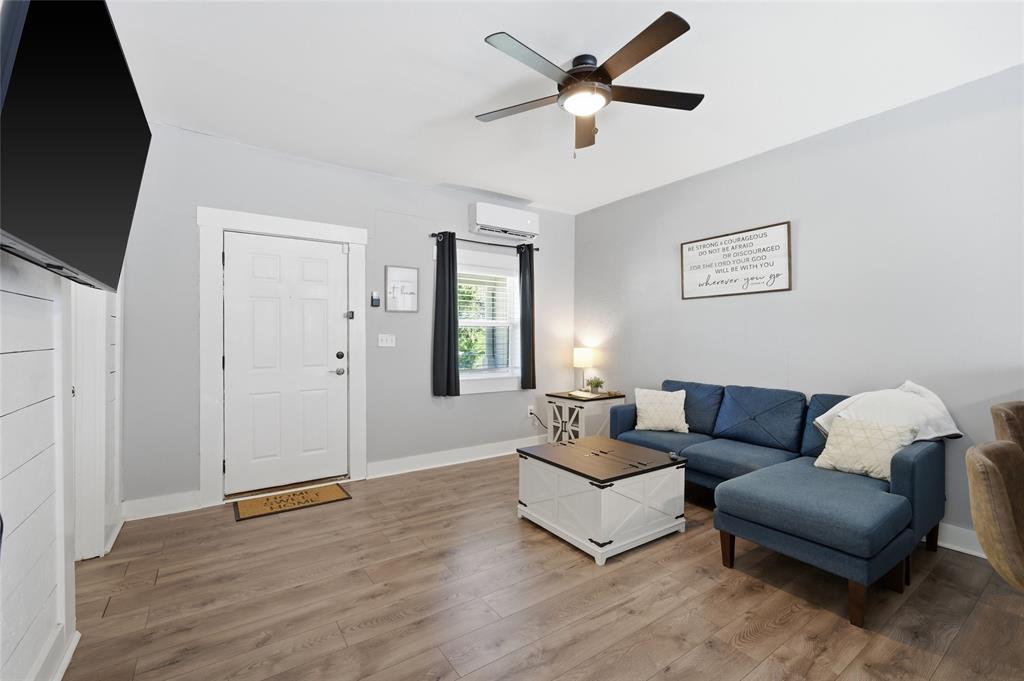 2320 Mistletoe Street Waco, TX 76706 - Photo 6 of 23 a living room with furniture and a flat screen tv