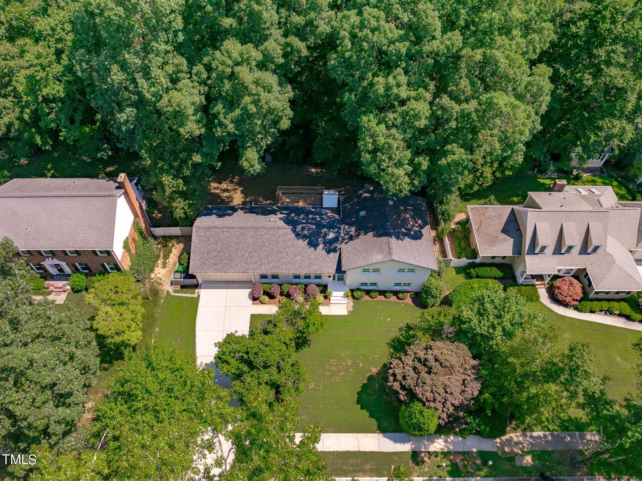 517 Compton Road Raleigh, NC 27609 - Photo 47 of 51 an aerial view of a house with garden space and street view