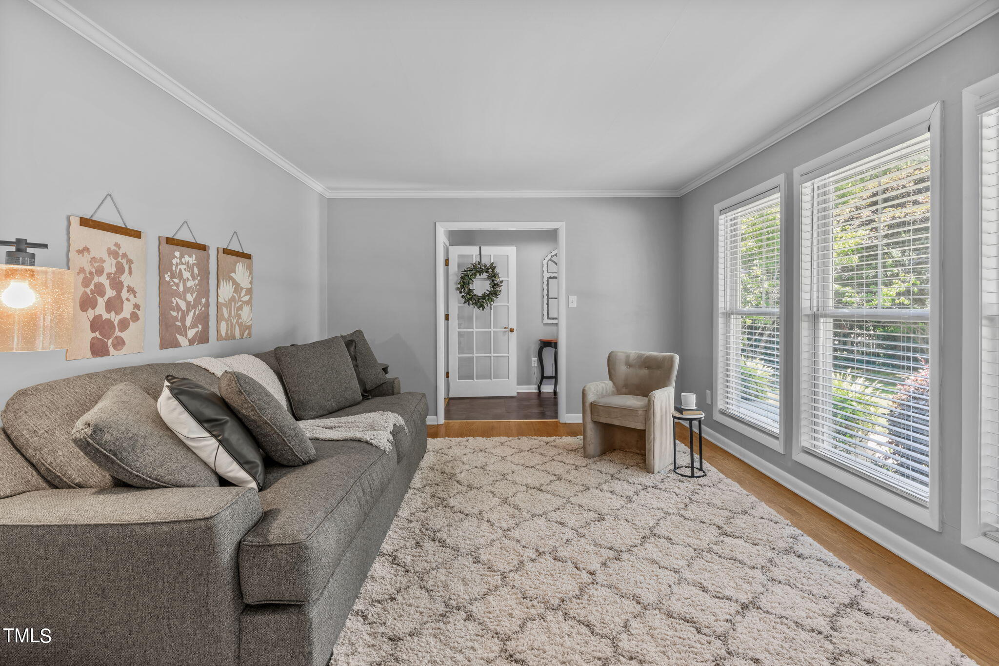 517 Compton Road Raleigh, NC 27609 - Photo 10 of 51 a living room with furniture and large windows