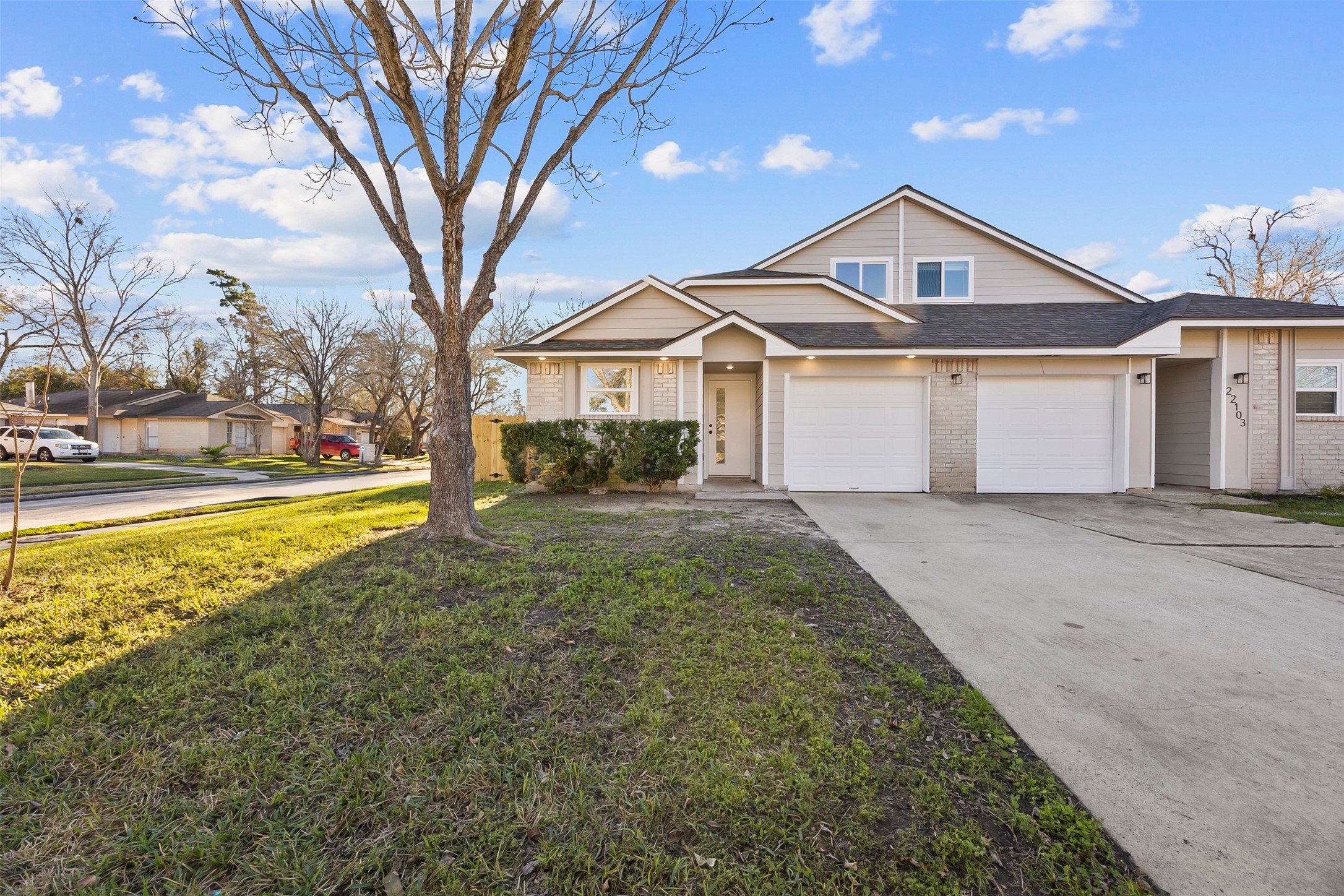 22101 Diane Drive Spring, TX 77373 - Photo 1 of 24 a front view of a house with a yard and trees