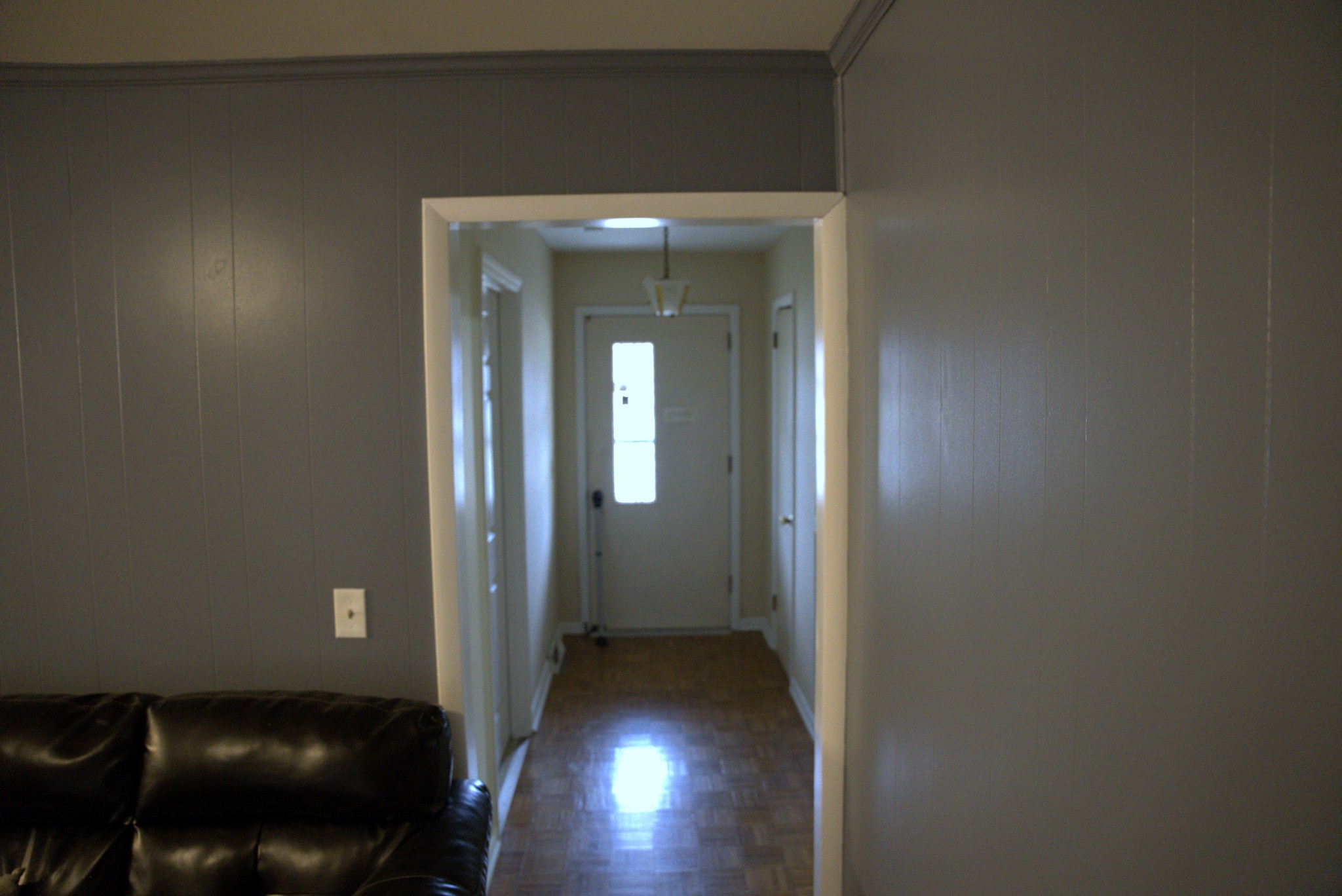 1246 Apache Lane Madison, TN 37115 - Photo 11 of 27 a view of a hallway with wooden floor and a chair