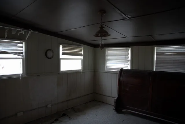 a bathroom with a toilet and a sink