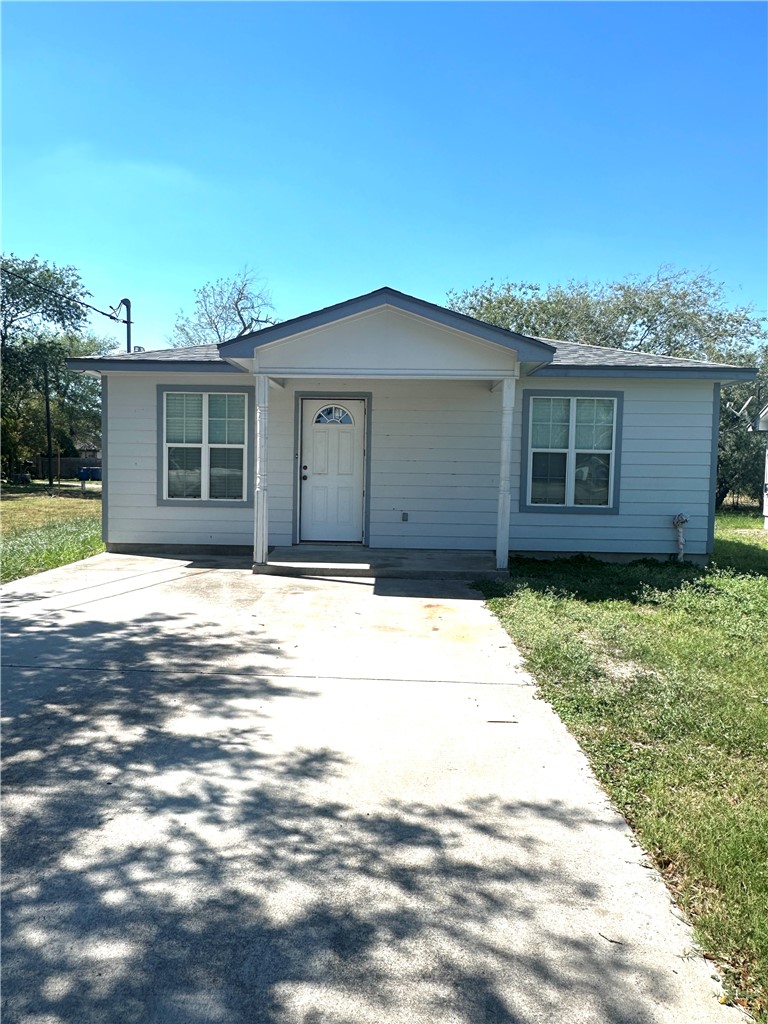 a house view with a backyard space