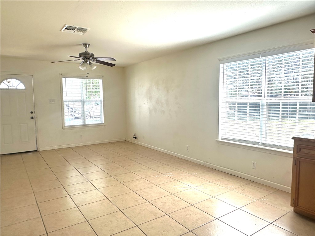 716 Sodville Road Sinton, TX 78387 - Photo 4 of 11 a view of an empty room with a window