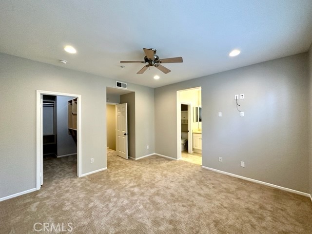 10 Paseo Rosa San Clemente, CA 92673 - Photo 14 of 46 en view of a livingroom with a chandelier fan and windows