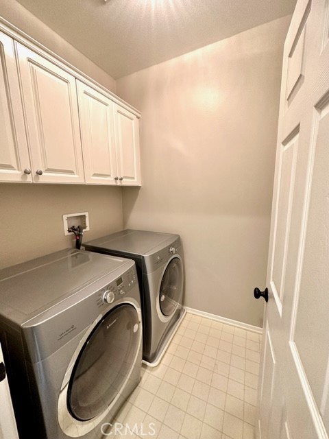 10 Paseo Rosa San Clemente, CA 92673 - Photo 26 of 46 a utility room with dryer and washer