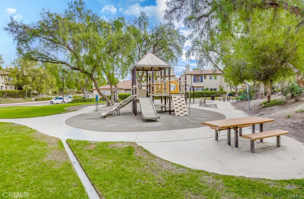 10 Paseo Rosa San Clemente, CA 92673 - Photo 37 of 46 a view of a house with garden and a slide