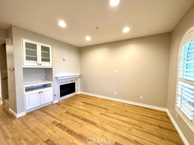 10 Paseo Rosa San Clemente, CA 92673 - Photo 9 of 46 a view of empty room with a fireplace and windows