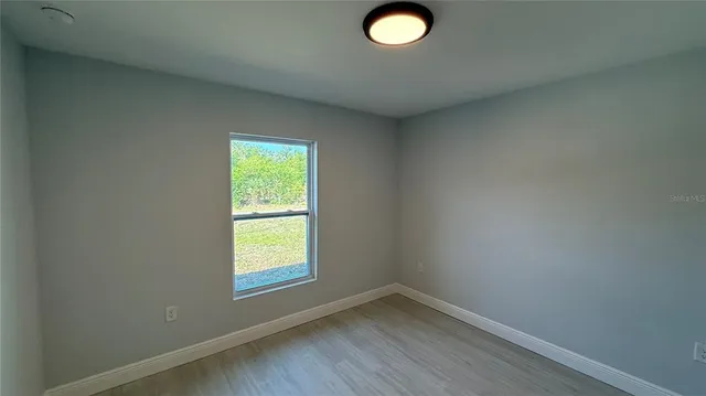 a view of empty room with window