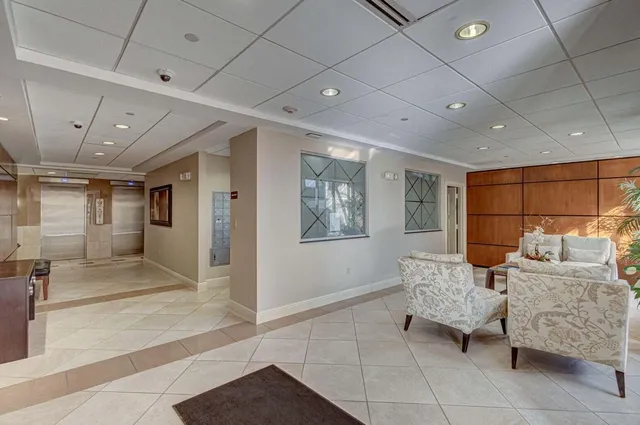 a view of a livingroom with furniture and window