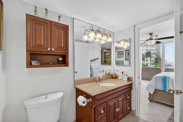 a view of a garden with a bench in a garden