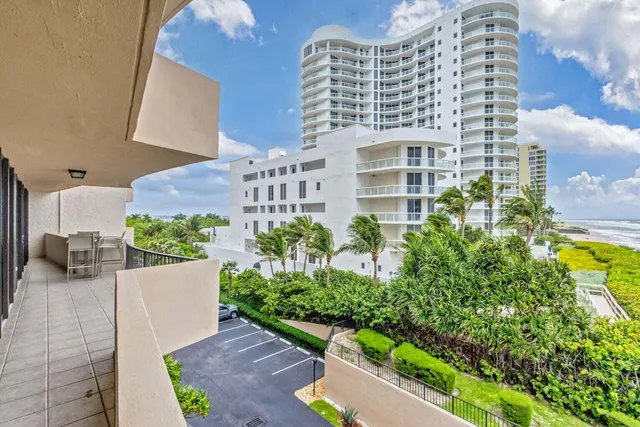 a living room with furniture and white walls
