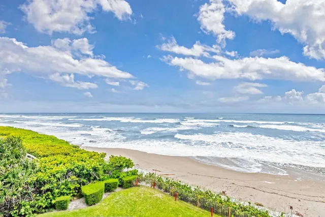 a bathroom with a sink vanity granite toilet and shower